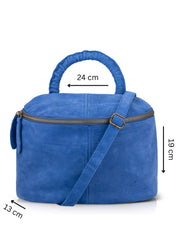 A small leather bag with a handle and a blue color combination