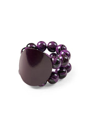 A bracelet with wooden beads and a purple disk