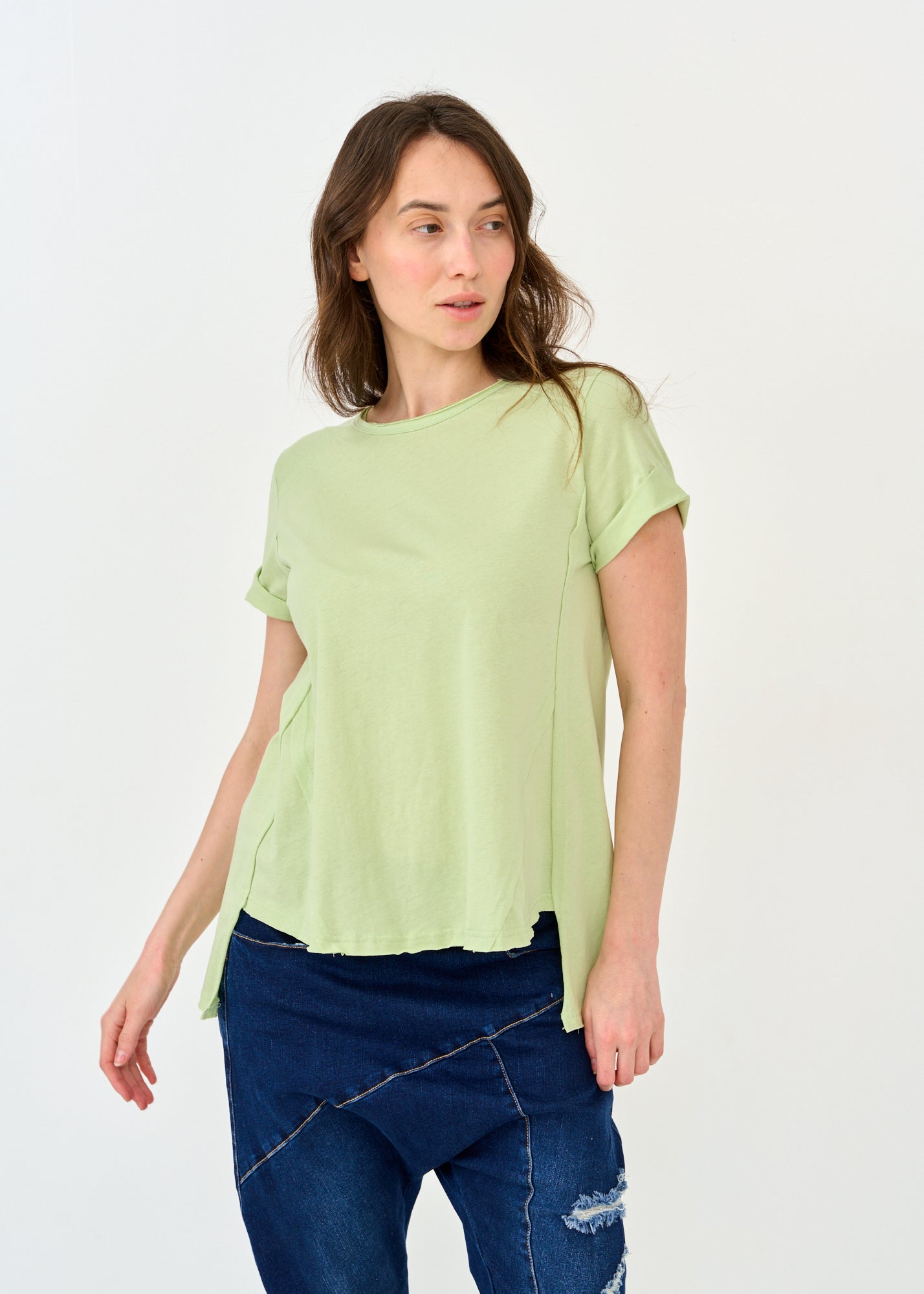 Rounded front short sleeve shirt with green cutouts