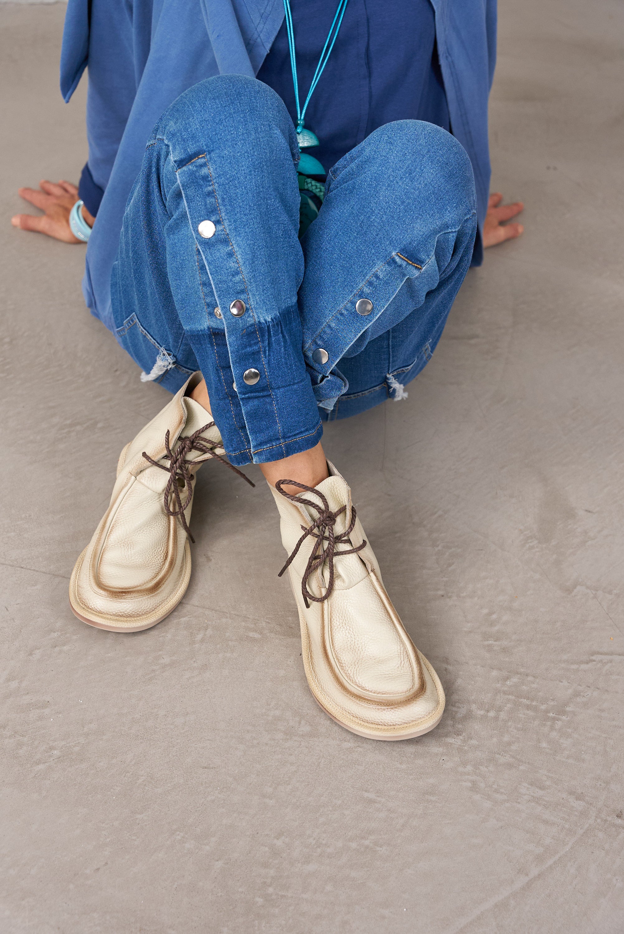 Wash soft leather boots with stone laces