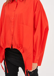 Buttoned shirt with red drawstring