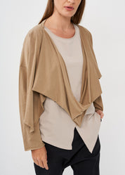 A thin top with a brown wrapped scarf