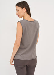 Tank top with diagonal stitches and dark gray spikes