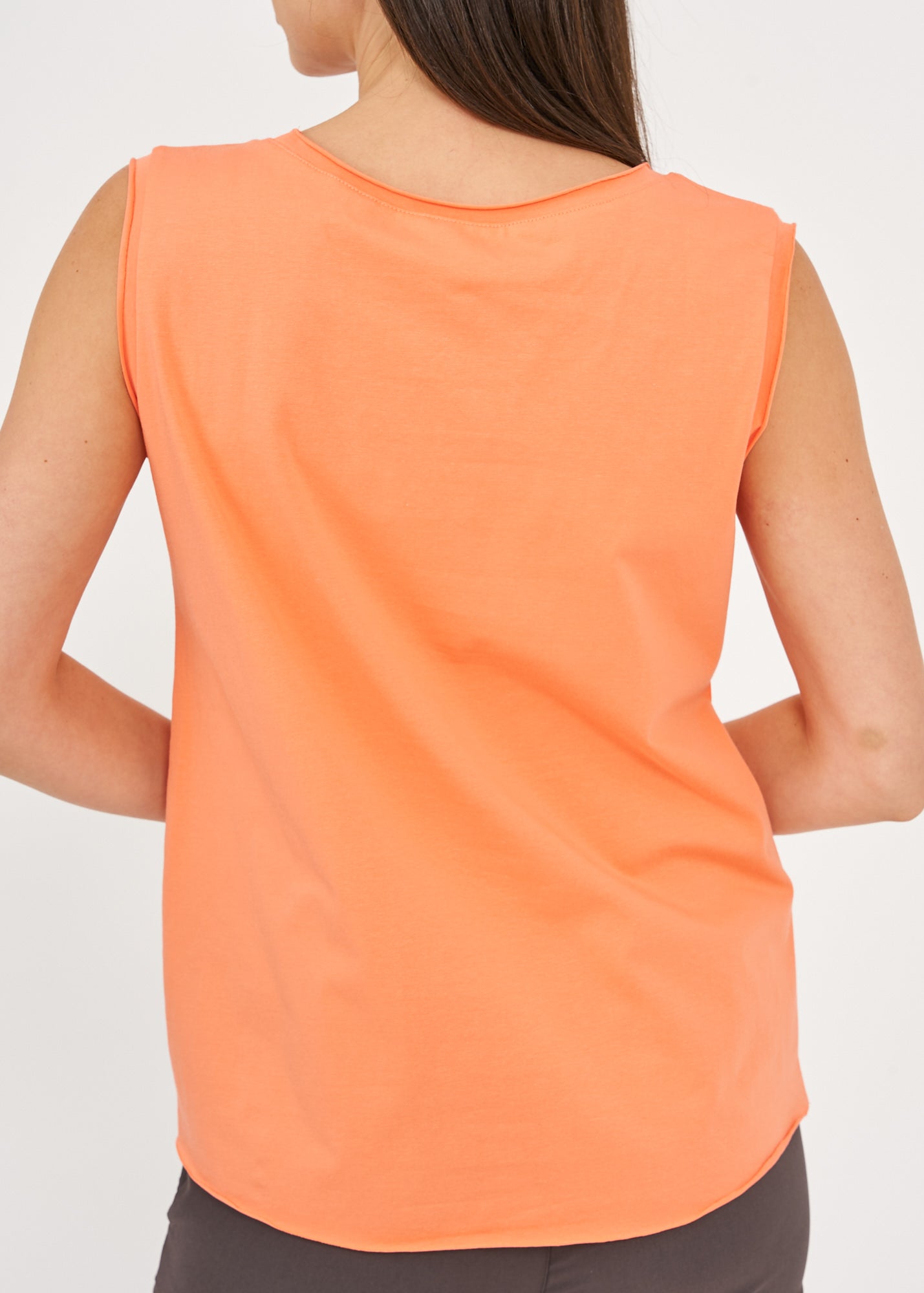 Orange top with diagonal stitching