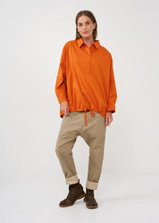 Half button shirt and orange collar