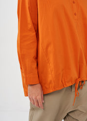 Half button shirt and orange collar