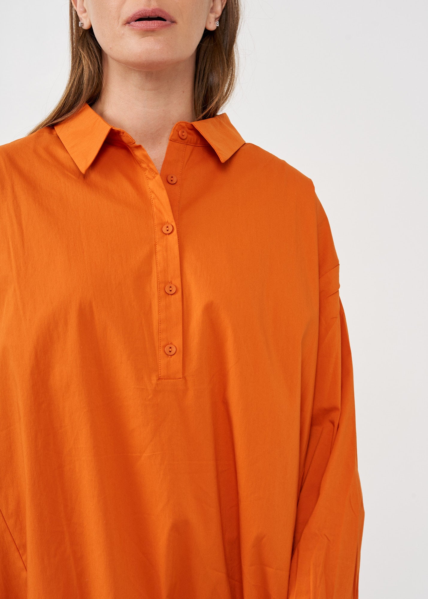 Half button shirt and orange collar