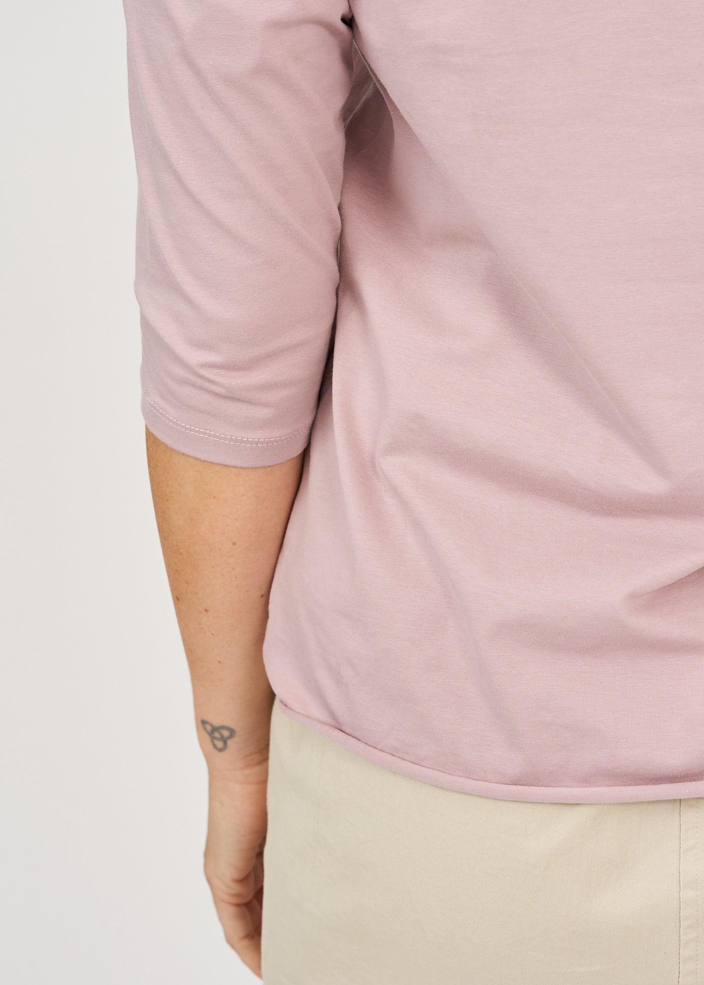 Diagonal stitching ends pink 3/4 sleeve