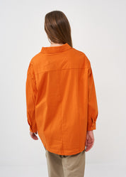 Half button shirt and orange collar