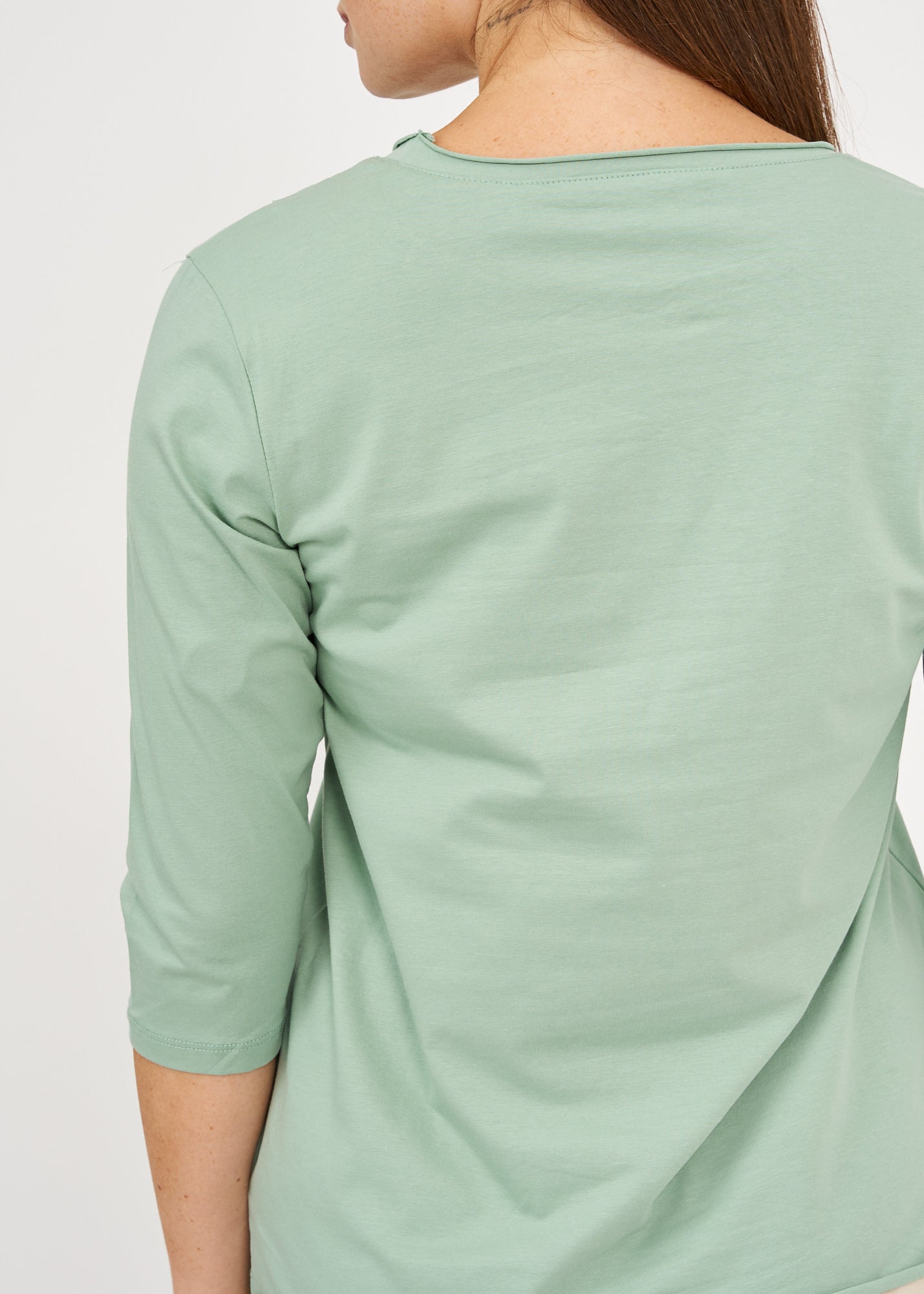 Diagonal stitching ends light green 3/4 sleeve