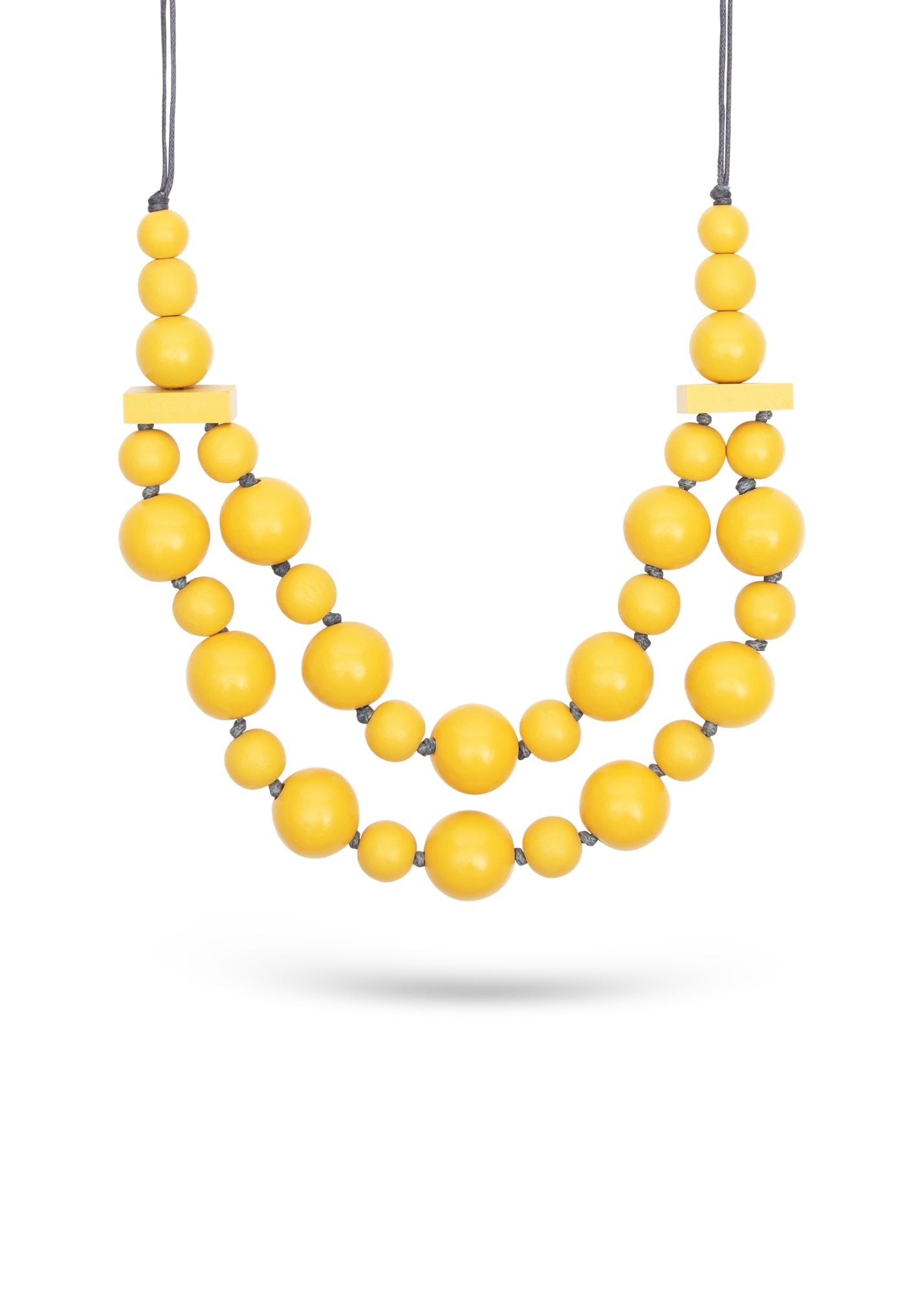 Handmade necklace with wooden beads in two mustard sizes