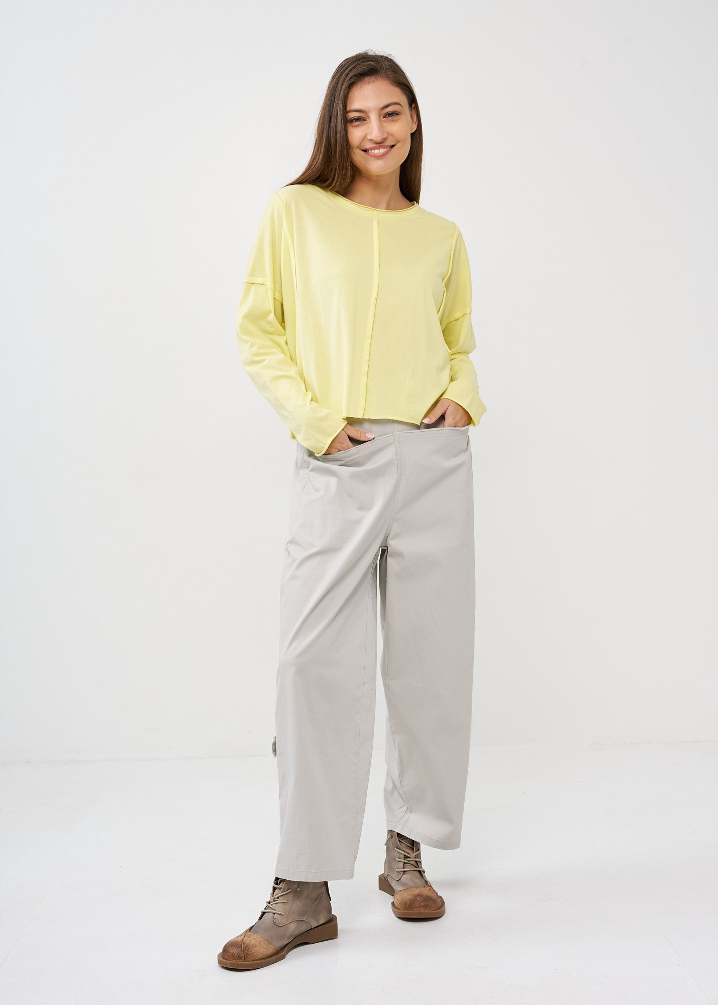 Light gray wide leg pants with straight pockets