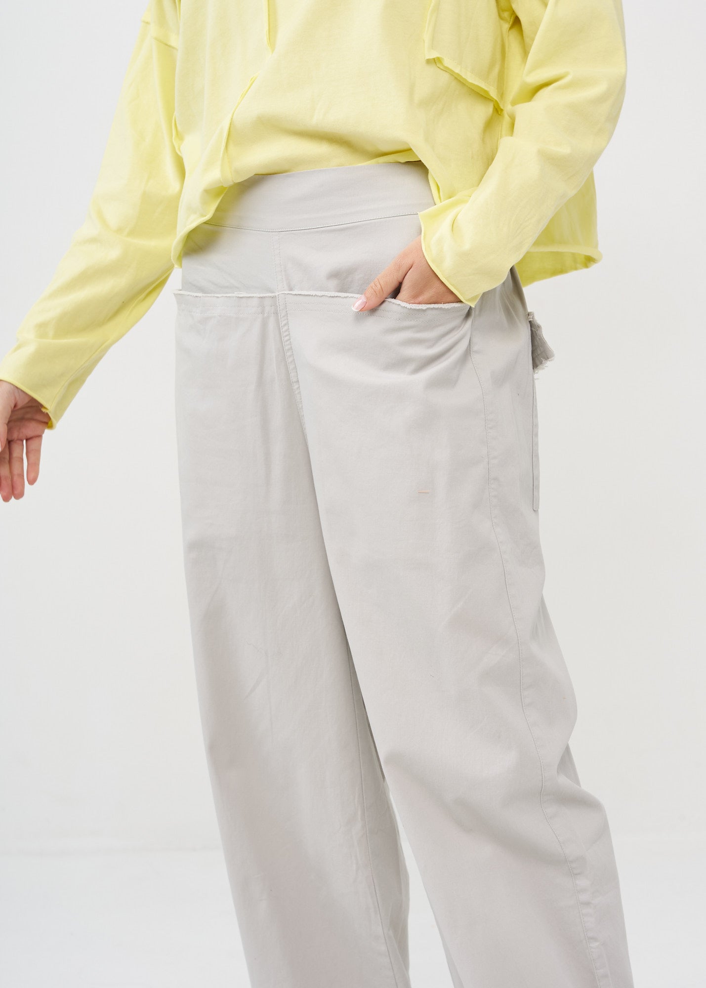 Light gray wide leg pants with straight pockets