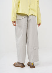 Light gray wide leg pants with straight pockets