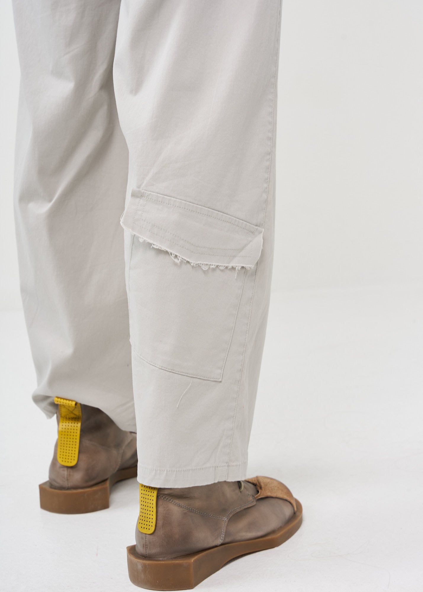 Light gray wide leg pants with straight pockets