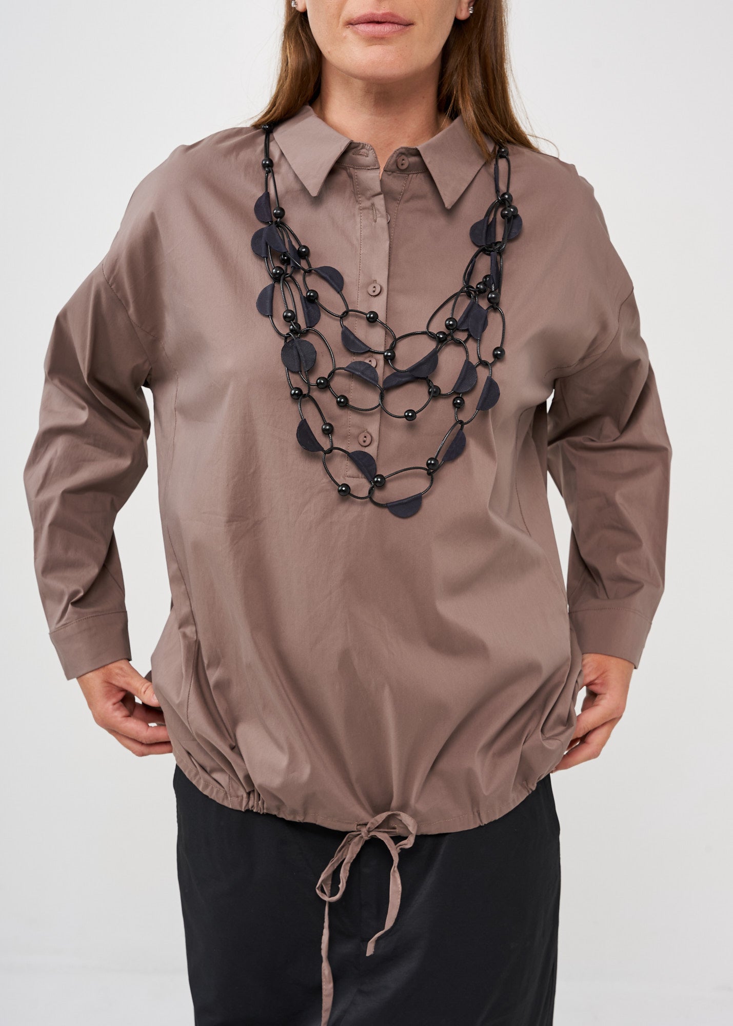 Half button shirt and brown collar