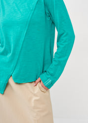 Long sleeve shirt with a turquoise ribbon combination