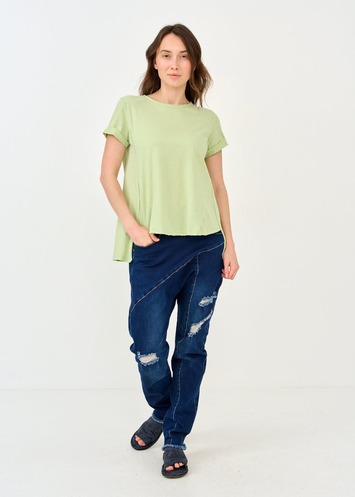 Rounded front short sleeve shirt with green cutouts