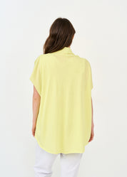 A shirt with a ribbed collar and a yellow short sleeve