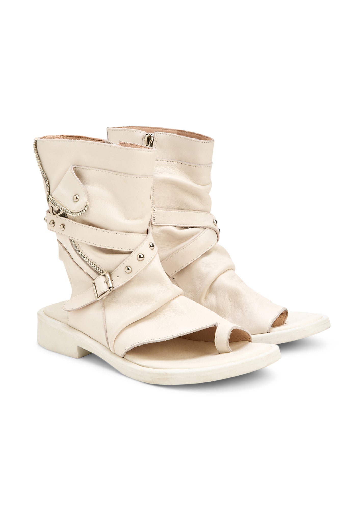 High sandals with straps and a white buckle