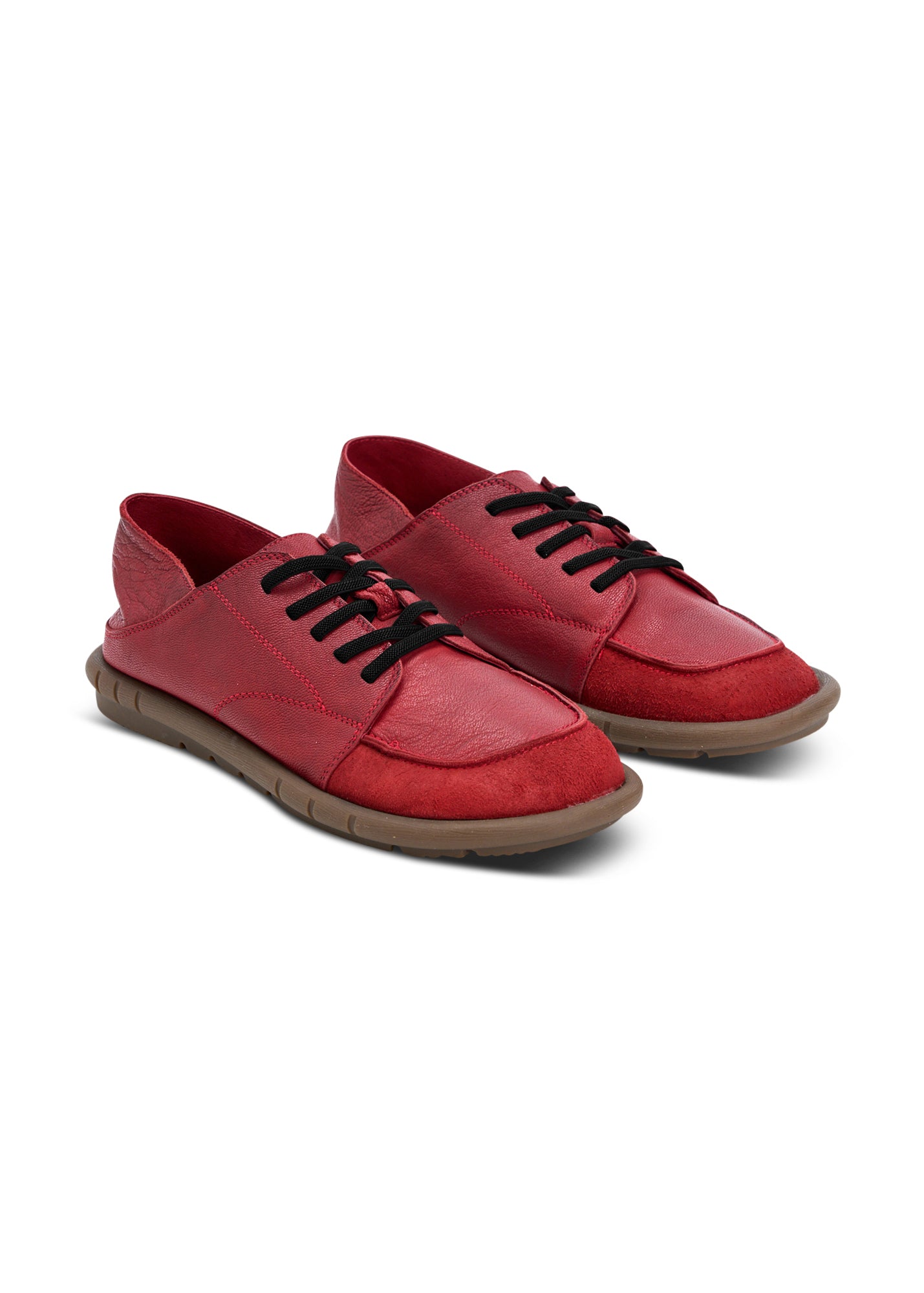 Soft leather shoes with a folding heel and red rubber laces