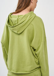 Oversized sweatshirt with a hood and a large green pocket