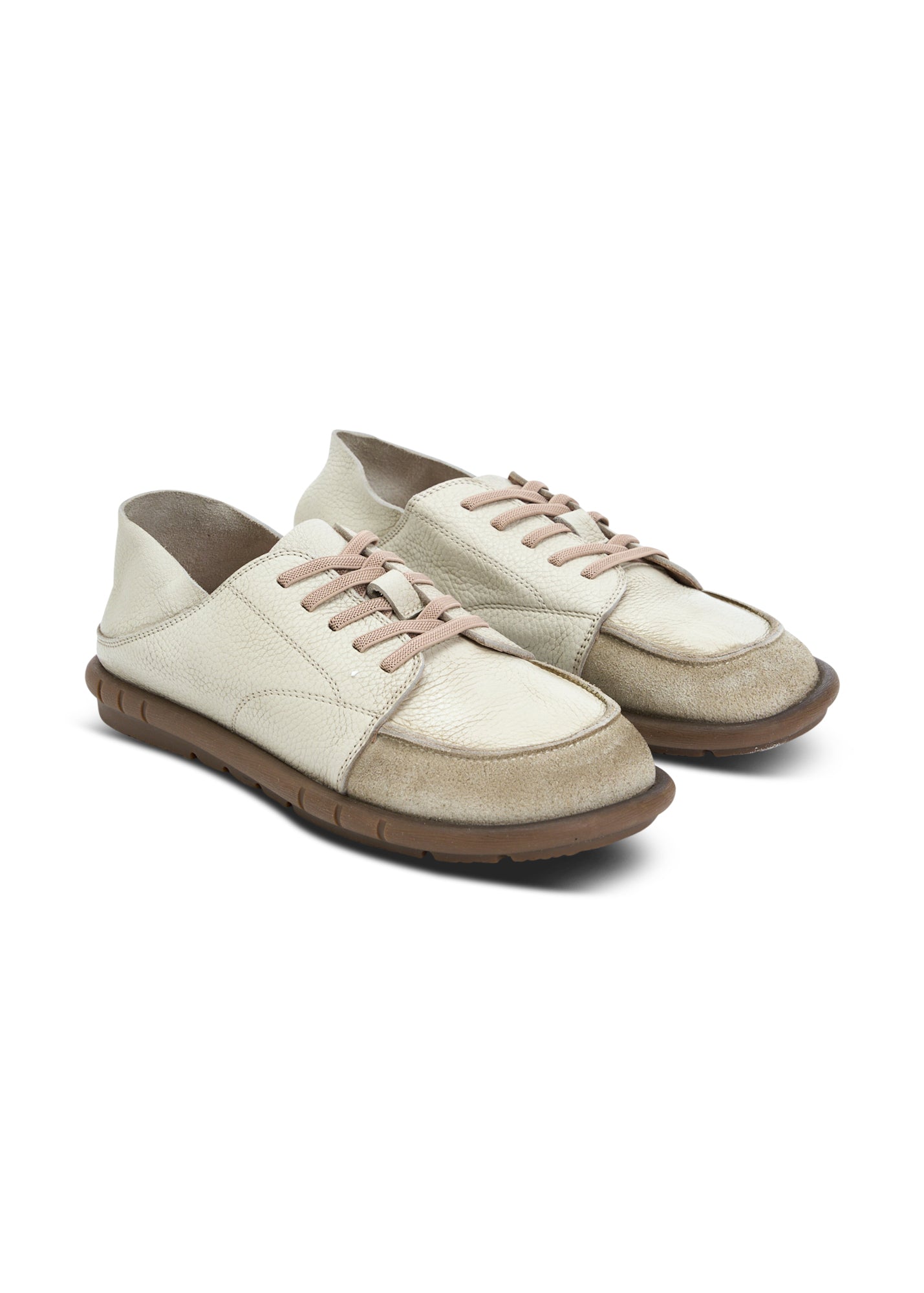 Soft leather shoes with a folding heel and gray rubber laces