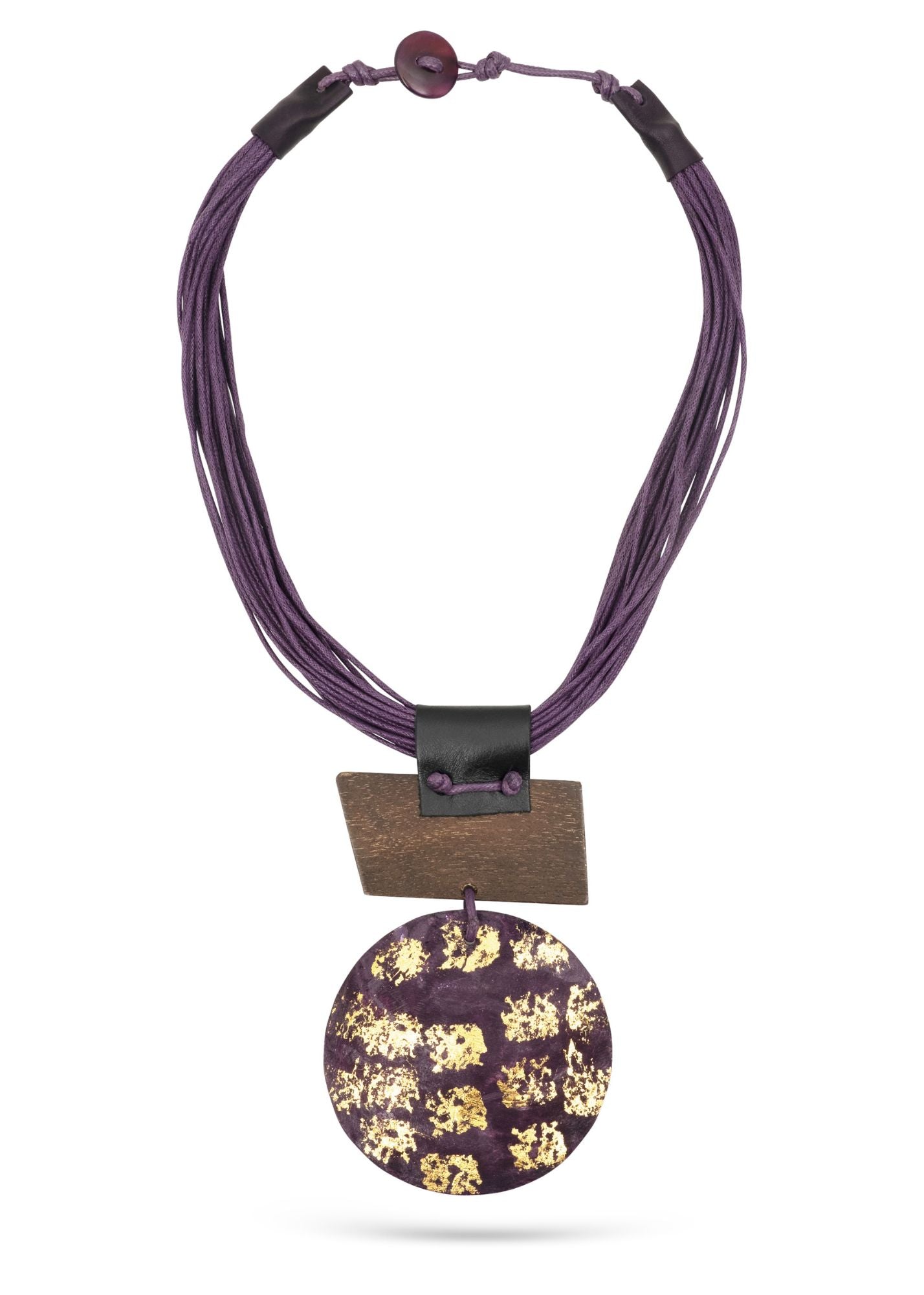 A large shell necklace on a purple tree