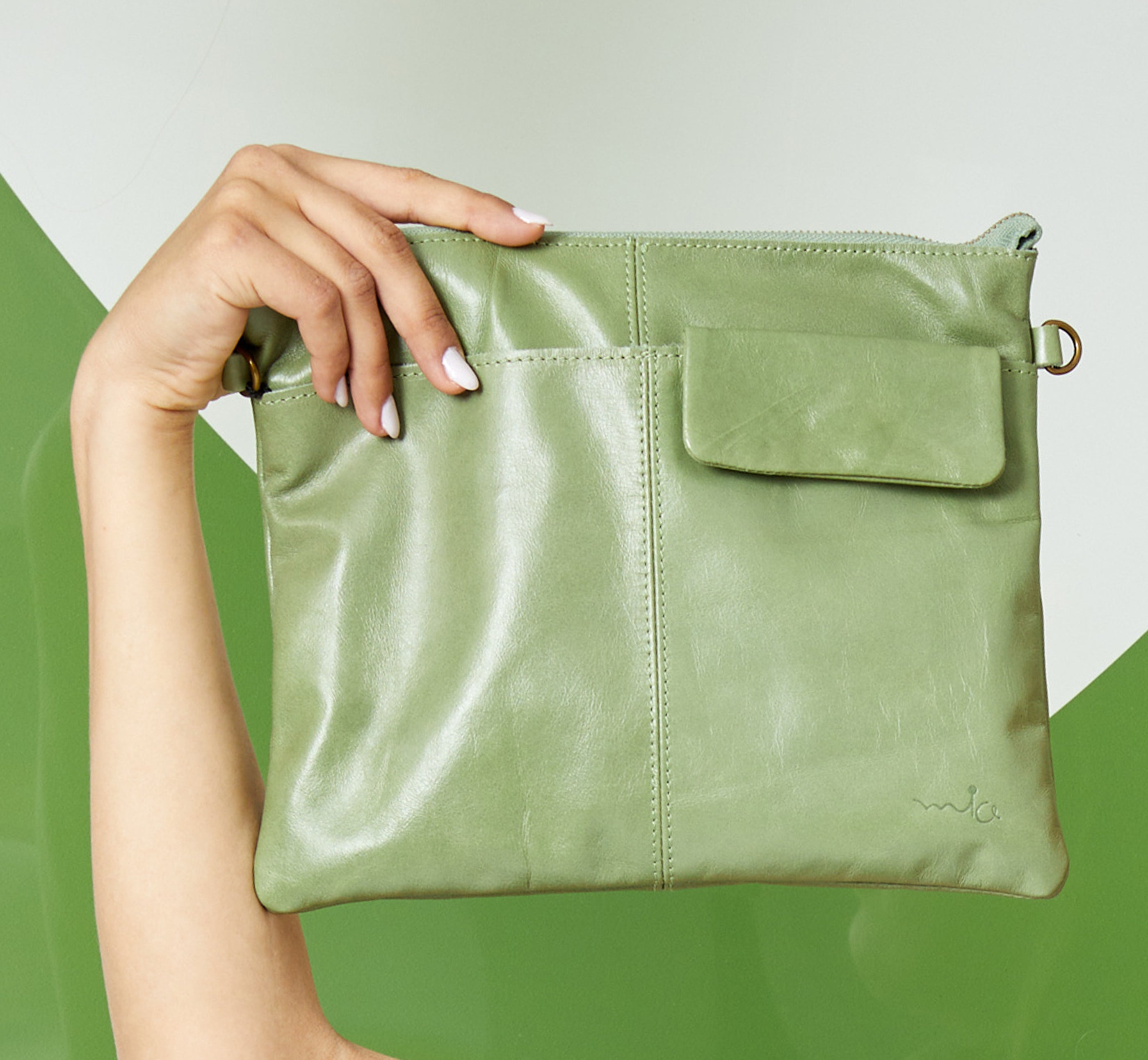 Leather evening bag with pocket and smoky light green flap