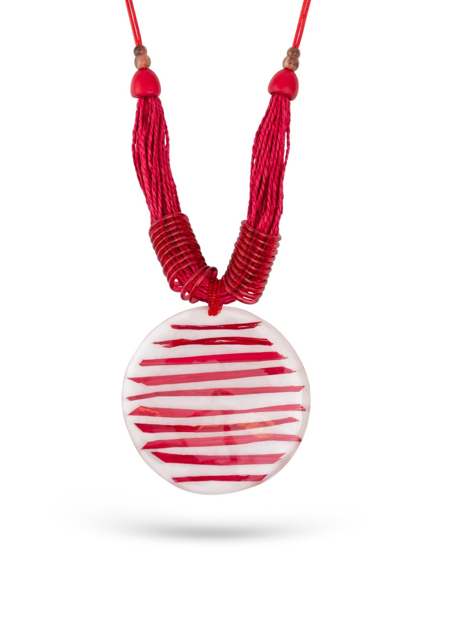 Handmade necklace with straw rows and red striped resin circle