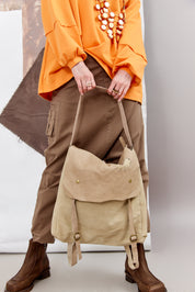 Canvas bag with beige patchwork leather shell