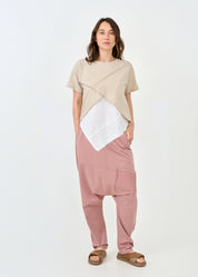 Pants with slits and a pink patch pocket