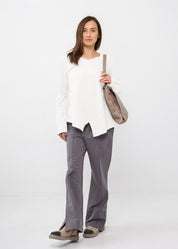 White long-sleeve v-neck asymmetric shirt