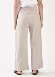 Wide pants with lip pockets on the back Stone