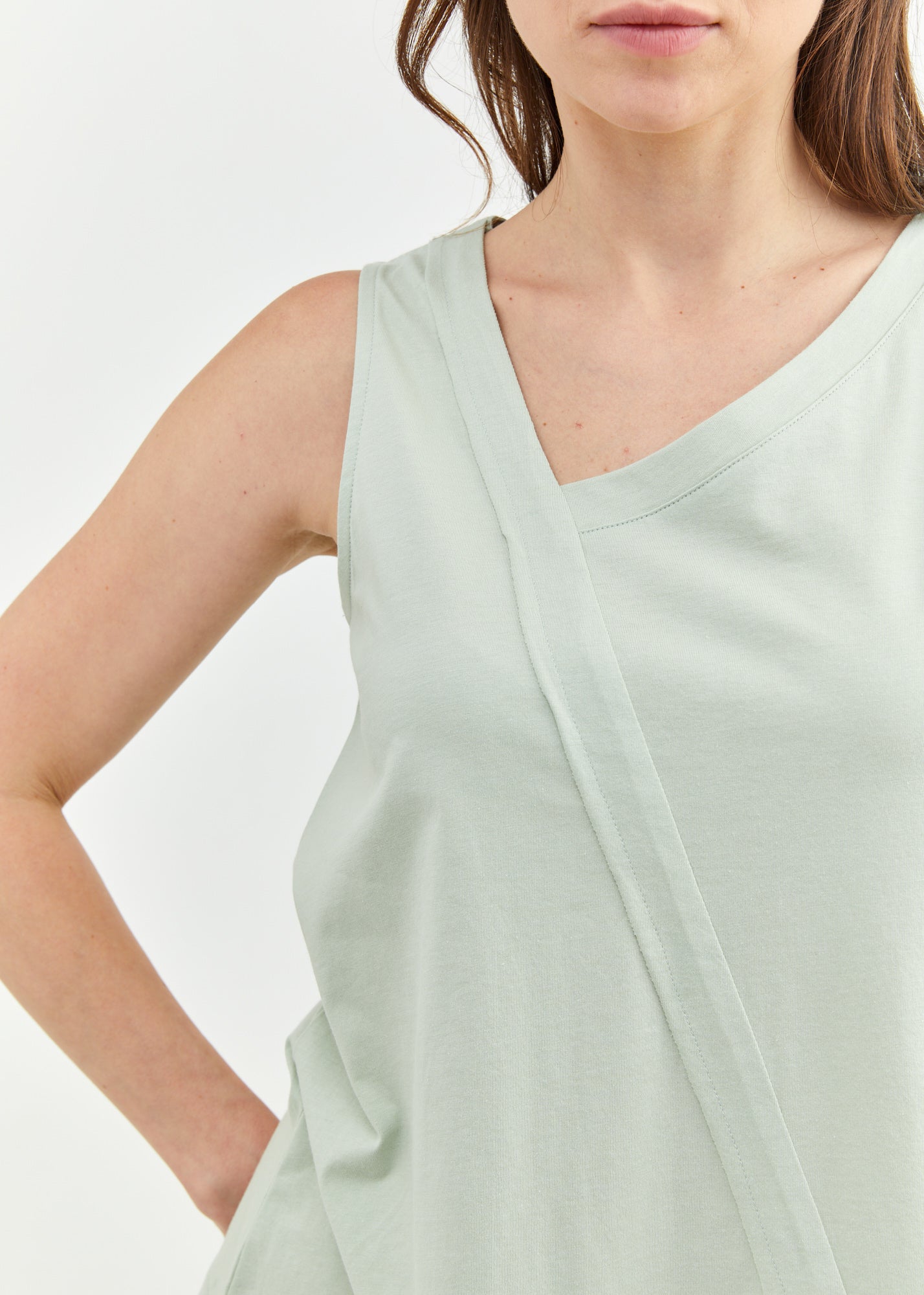 Light green asymmetric key triangle ending tank top