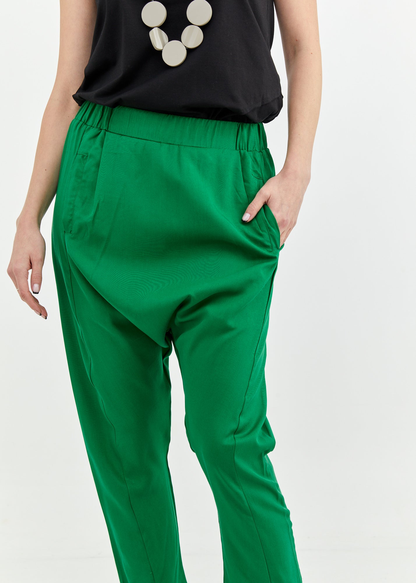 Green baggy pants with two pleats in front