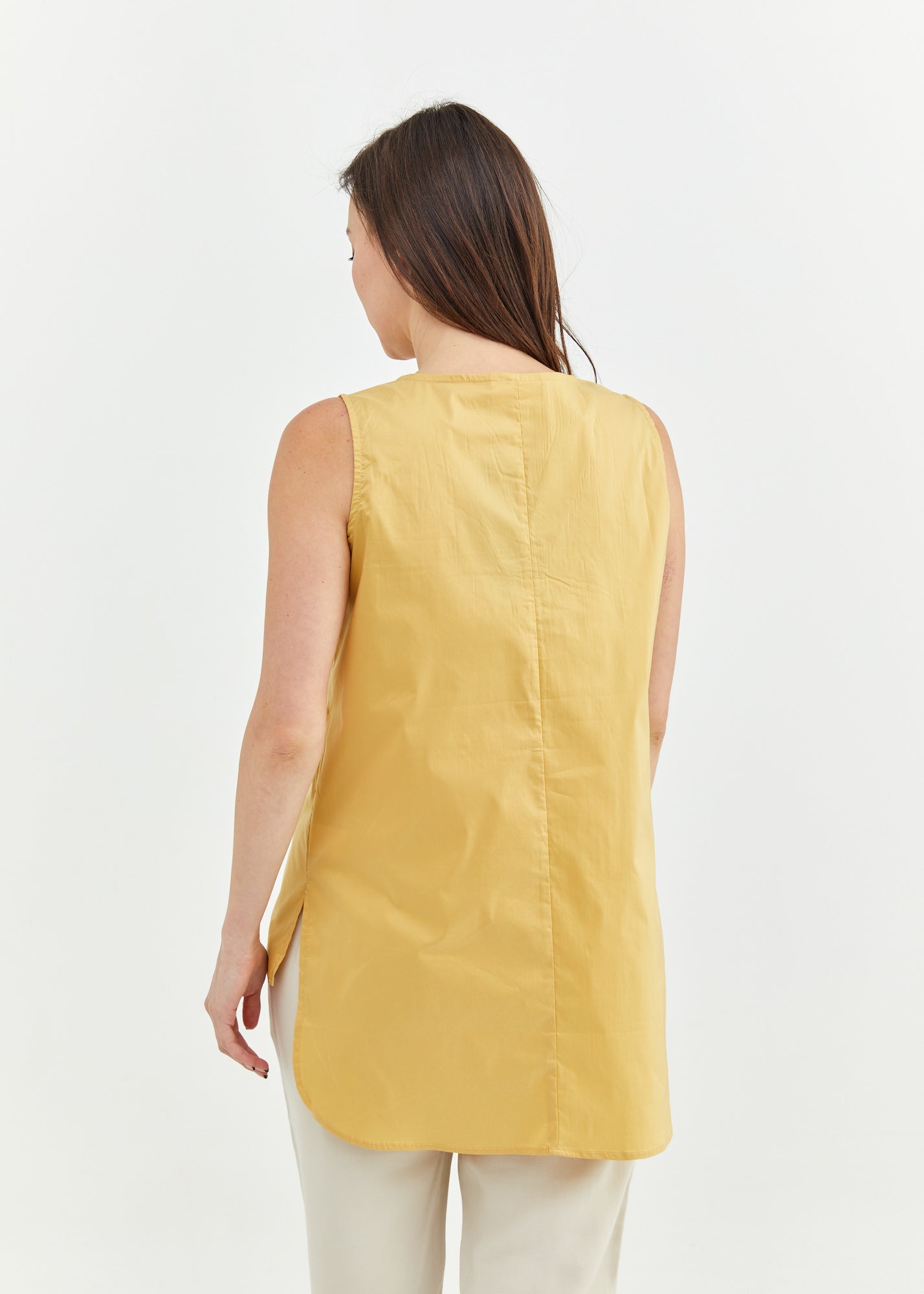 Asymmetric ending tank top and mustard fabric pocket