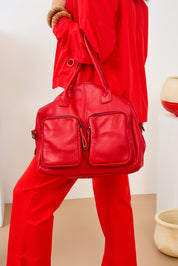 Red leather bag with two rectangular pockets