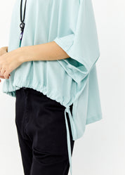 Short sleeve cotton shirt with turquoise drawstring