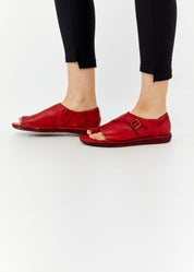 Closed back toe sandals with red buckle