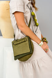 Green three-pocket leather evening bag