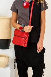 Red two-stripe folding leather side bag