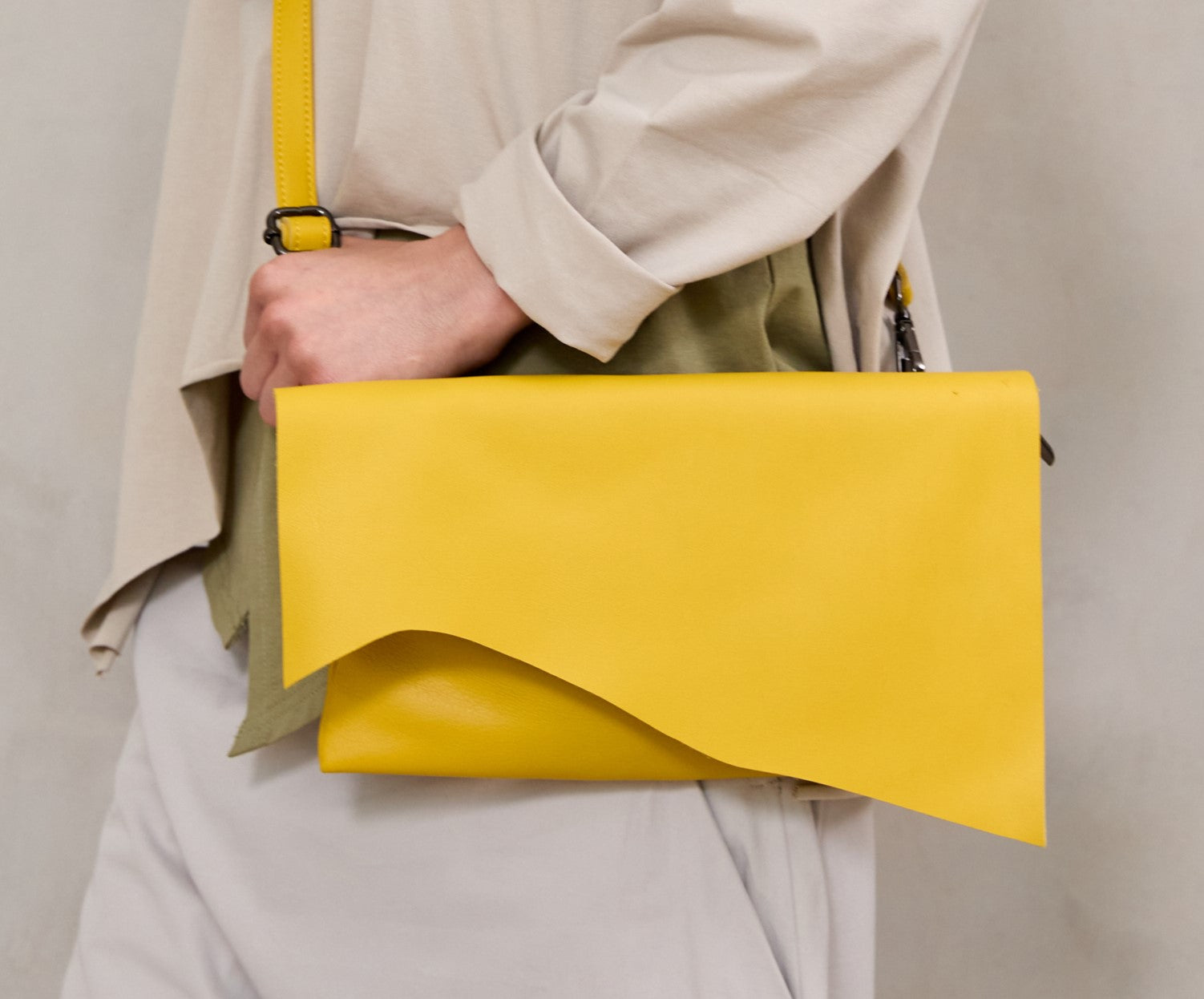 Rectangular leather evening bag with yellow asymmetric flap