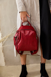 Small leather backpack red side compartments