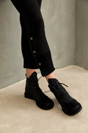 Reverse leather ankle boots color combination and black rubber laces