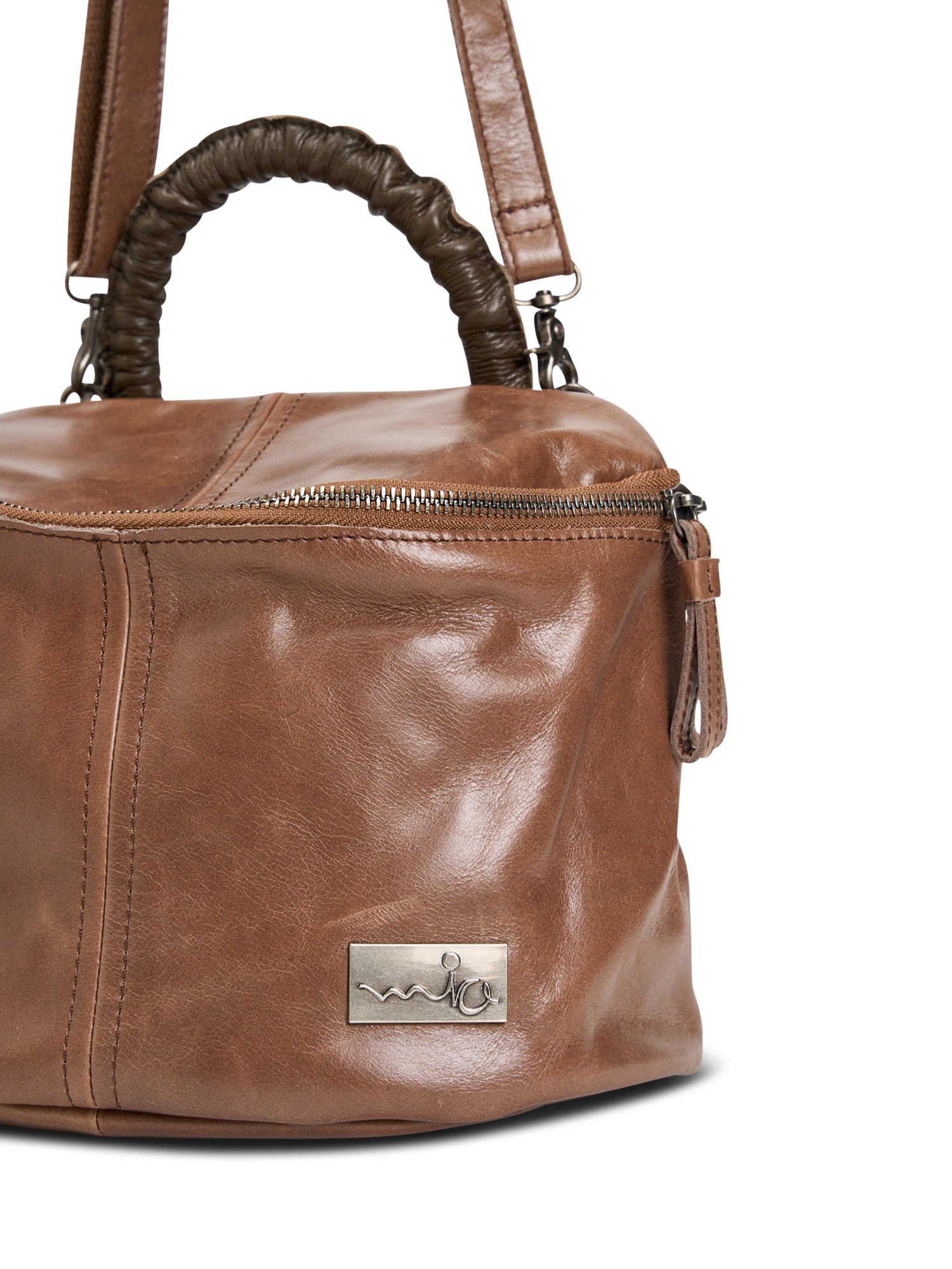 A small leather bag with a handle and a brown color combination