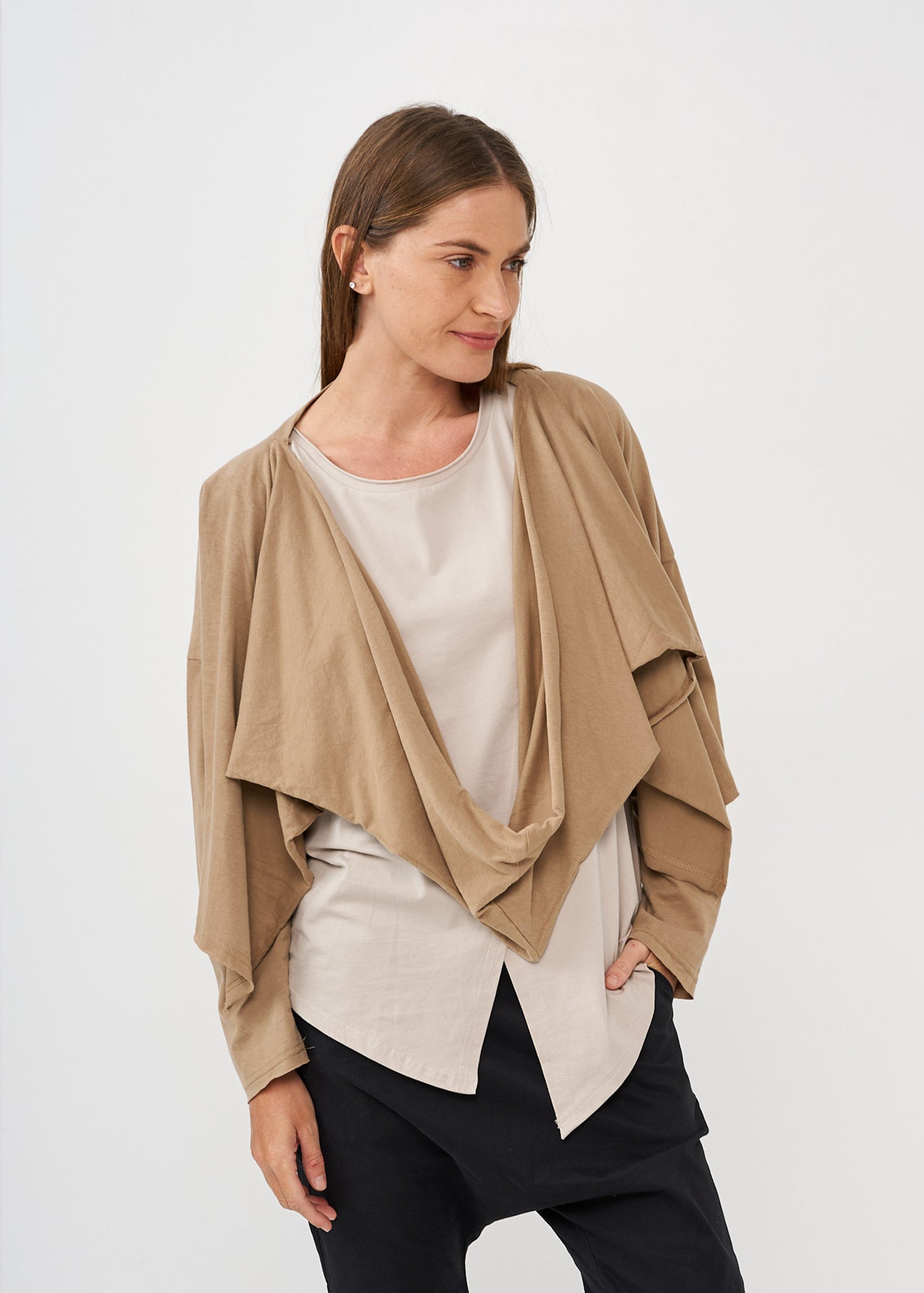 A thin top with a brown wrapped scarf