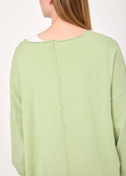 Green asymmetric extension knit