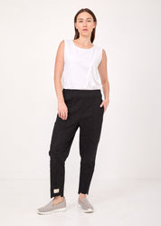 Pants with a seam in the middle and a classic black patch