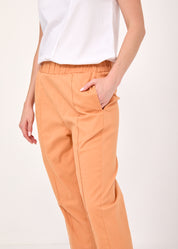 Pants with a seam in the middle and a classic orange patch